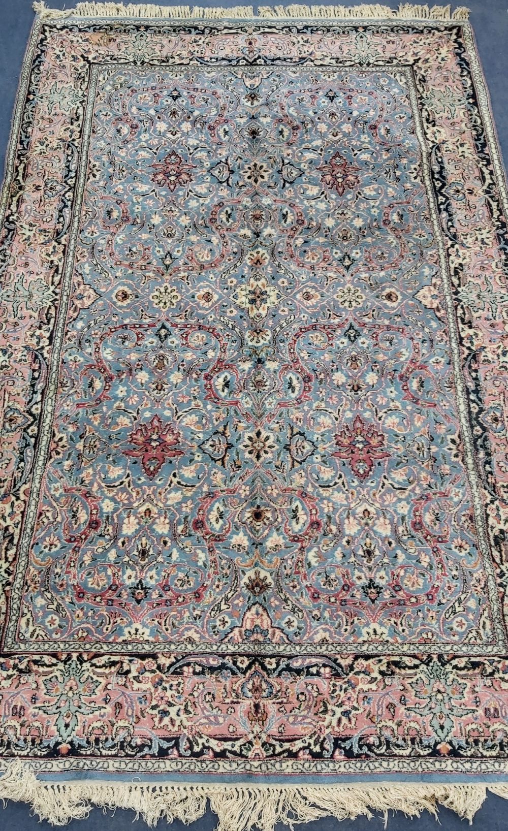 A Kirman carpet, 300 x 193cm